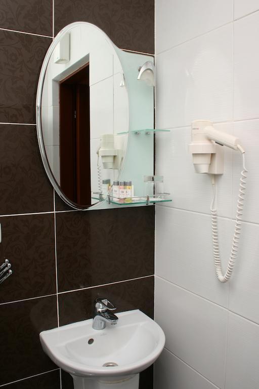 Premier Hotel Shafran Sumy Quarto foto